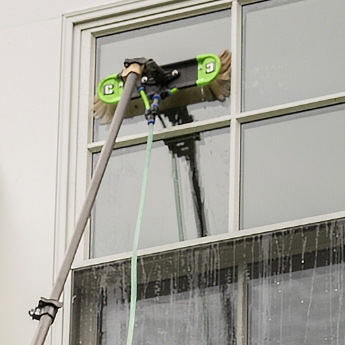 A window scrubber complete with a purified water cleaning system.